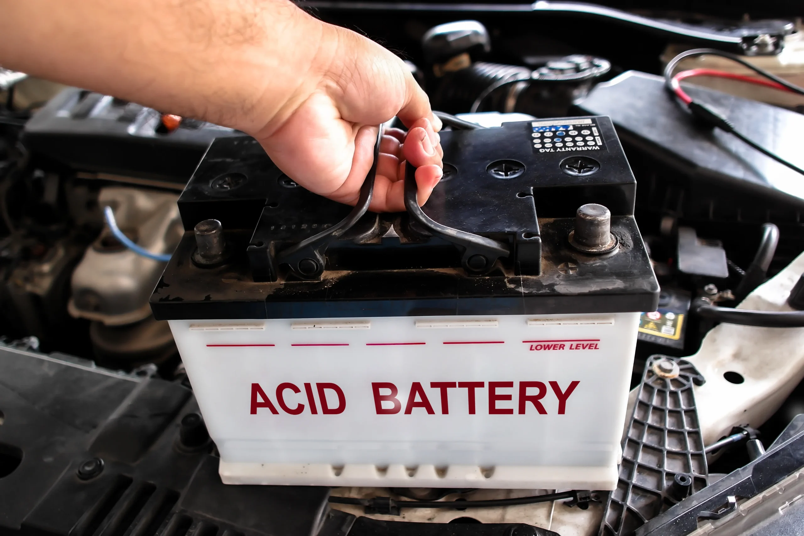 installing-replacement-acid-battery-vehicle-car-maintenance-concept