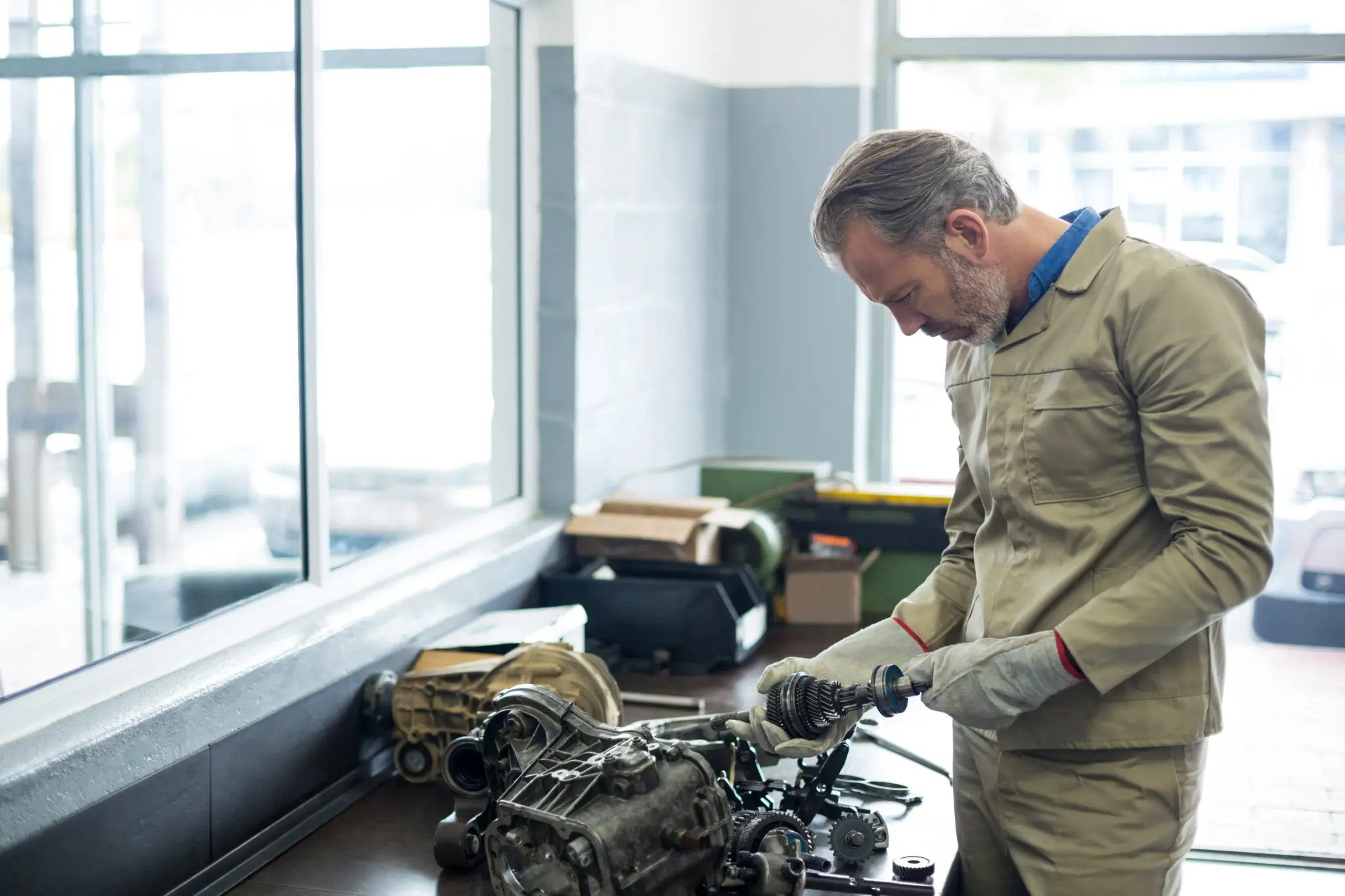 mechanic-checking-car-parts