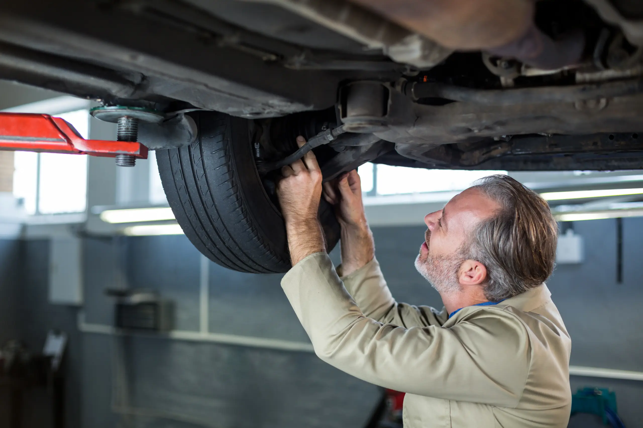 mechanic-servicing-car